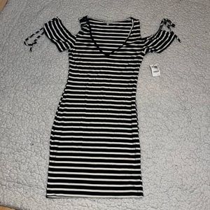 Two small dresses sold together! Never worn! Tags attached!